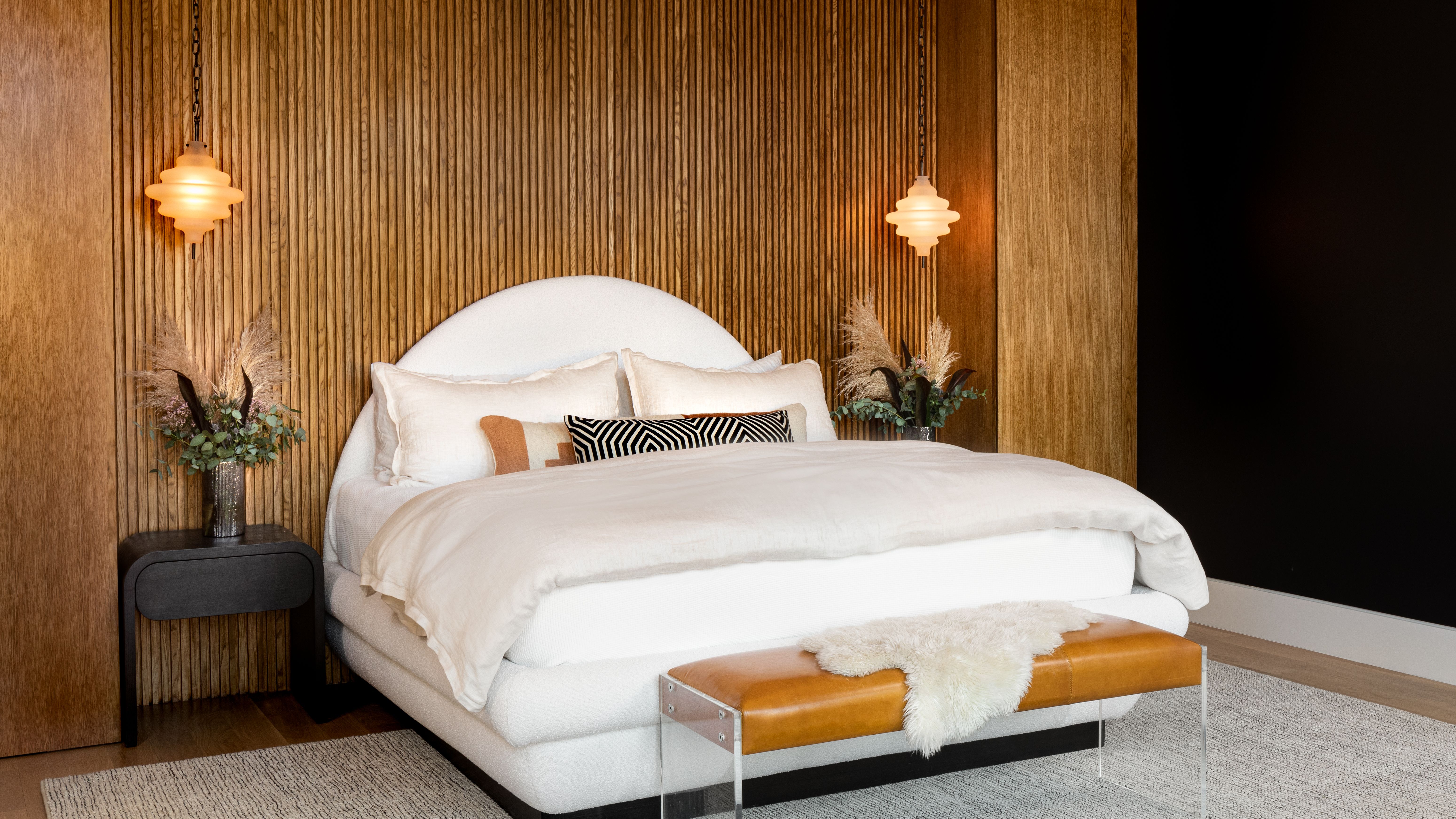Modern bedroom with accent wallpaper wall