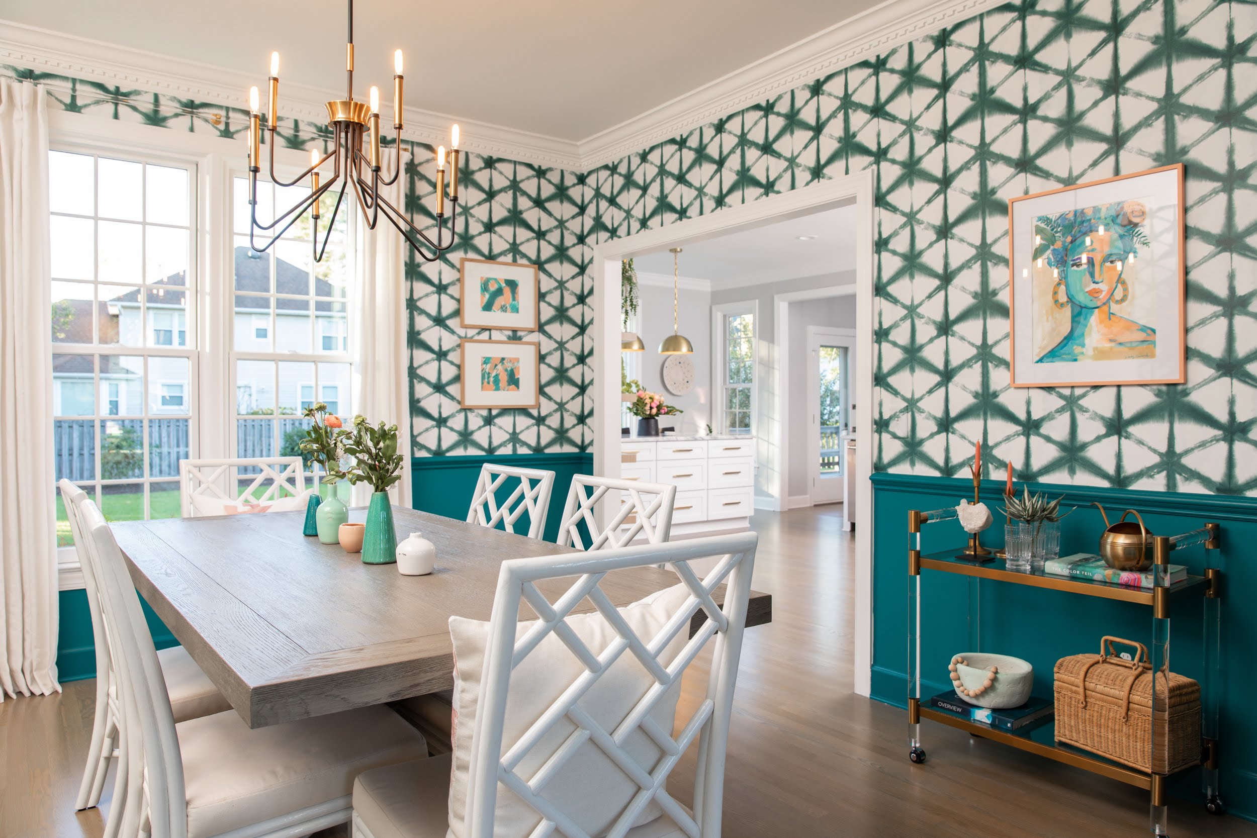 Elegant dining room with patterned wallpaper